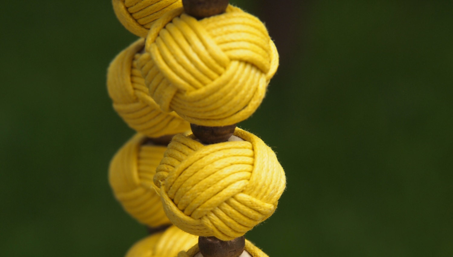 yellow wax linen covered wood necklace