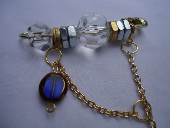 The Winter Crescent: pin with curved hammered silver cylinder, sapphire and copper beads, gold chain