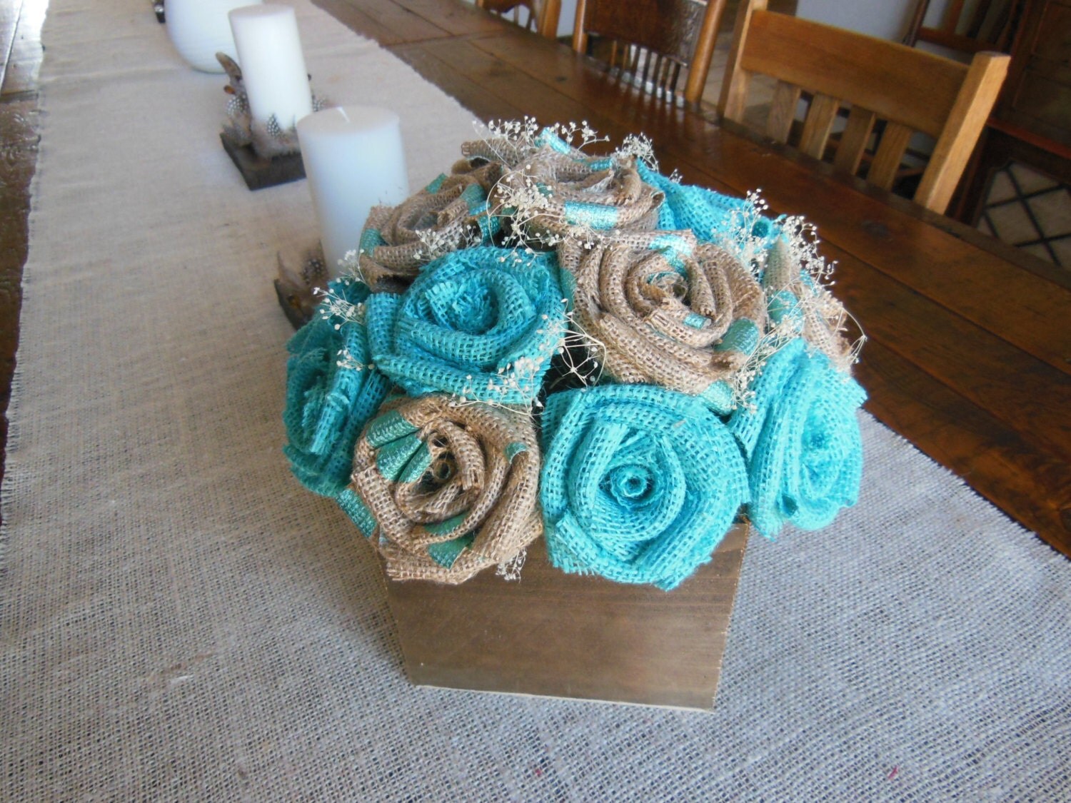 Light turquoise burlap flowers in a rustic barn wood box