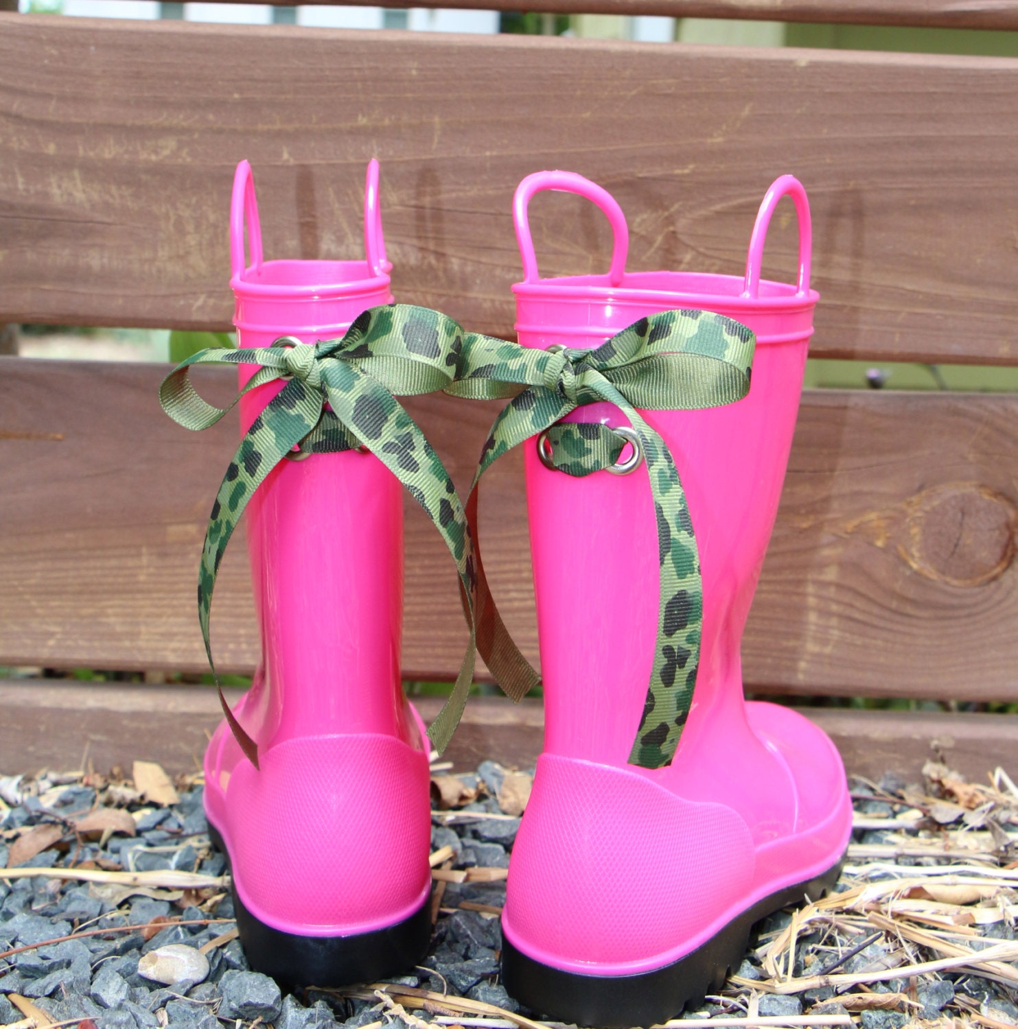 black and pink rain boots