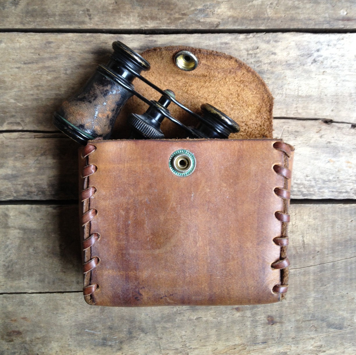 vintage c. 1970s handmade leather case with whipstitched border