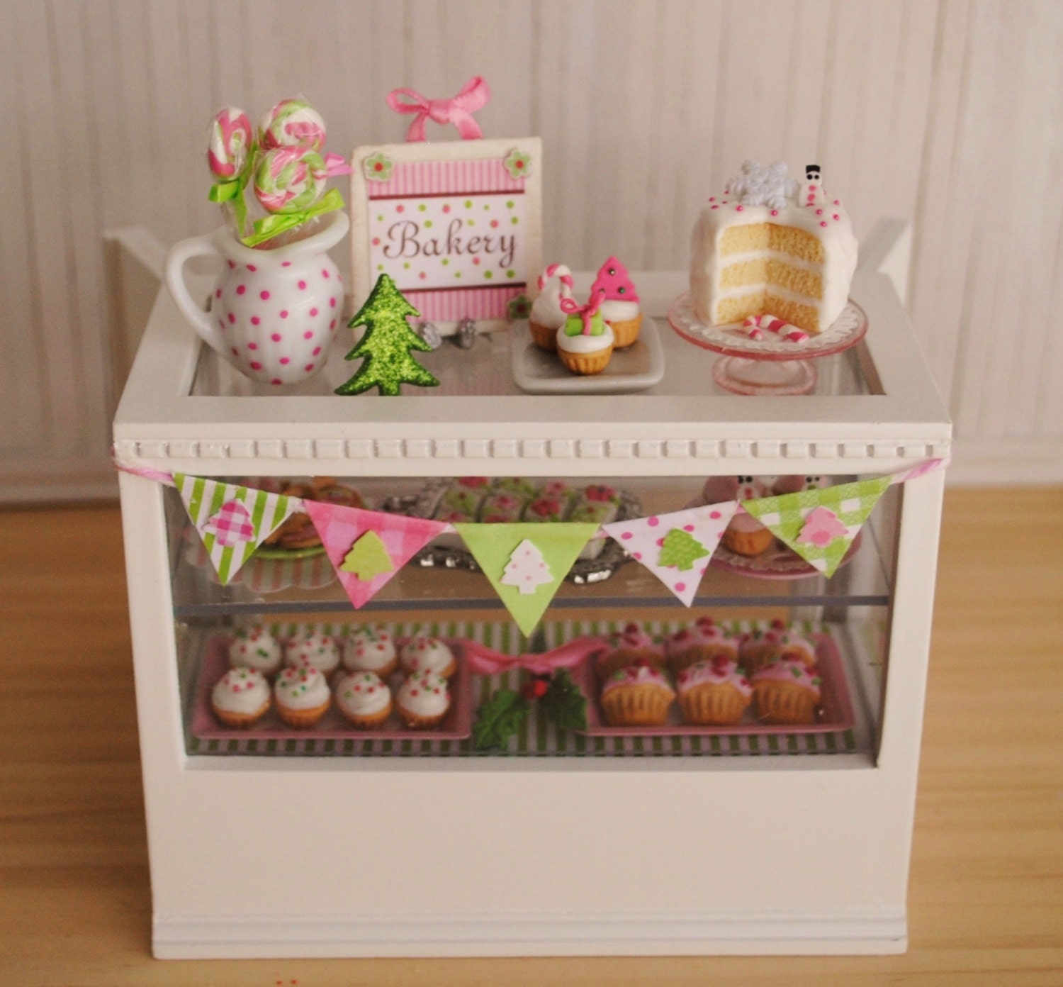 Miniature Christmas Bakery Case In Pink And Green Filled With Cupcakes, Cookies, Petit Fours, And More - LittleThingsByAnna