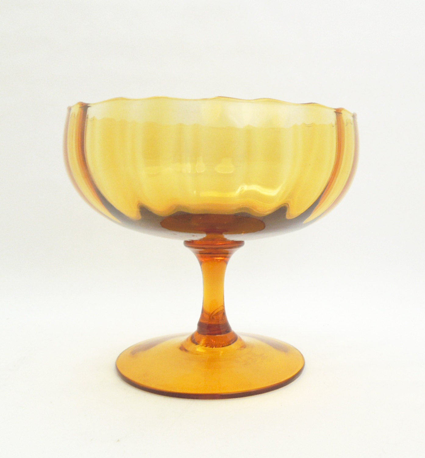 Items similar to Vintage pedestal amber glass fruit bowl compote candy