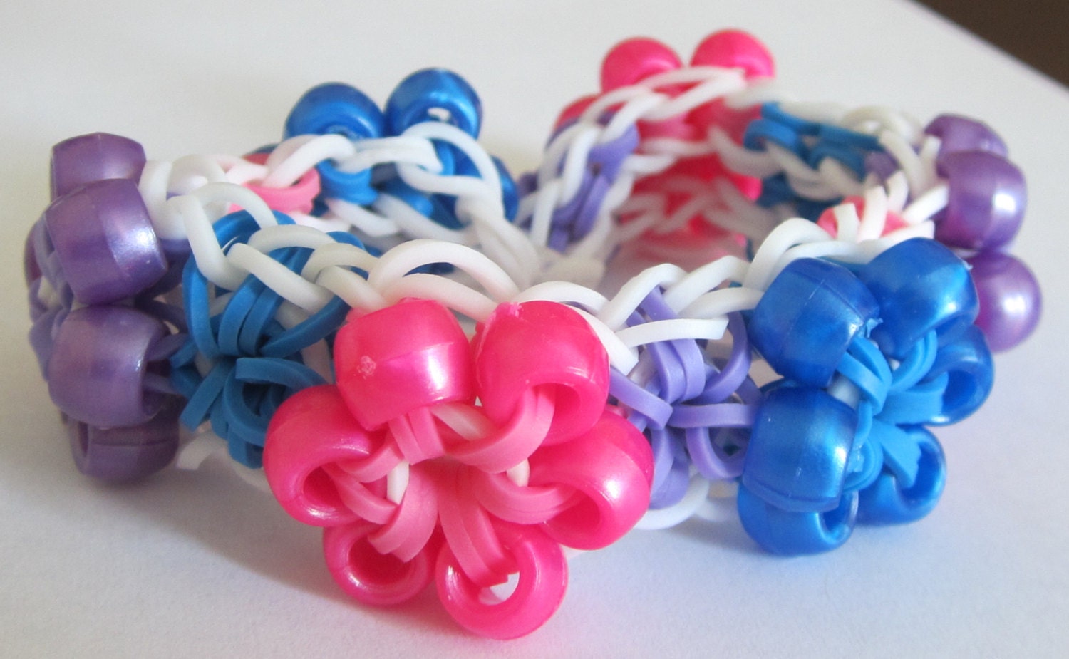 Items similar to Starburst with Beads Rubber Band Bracelet on Etsy