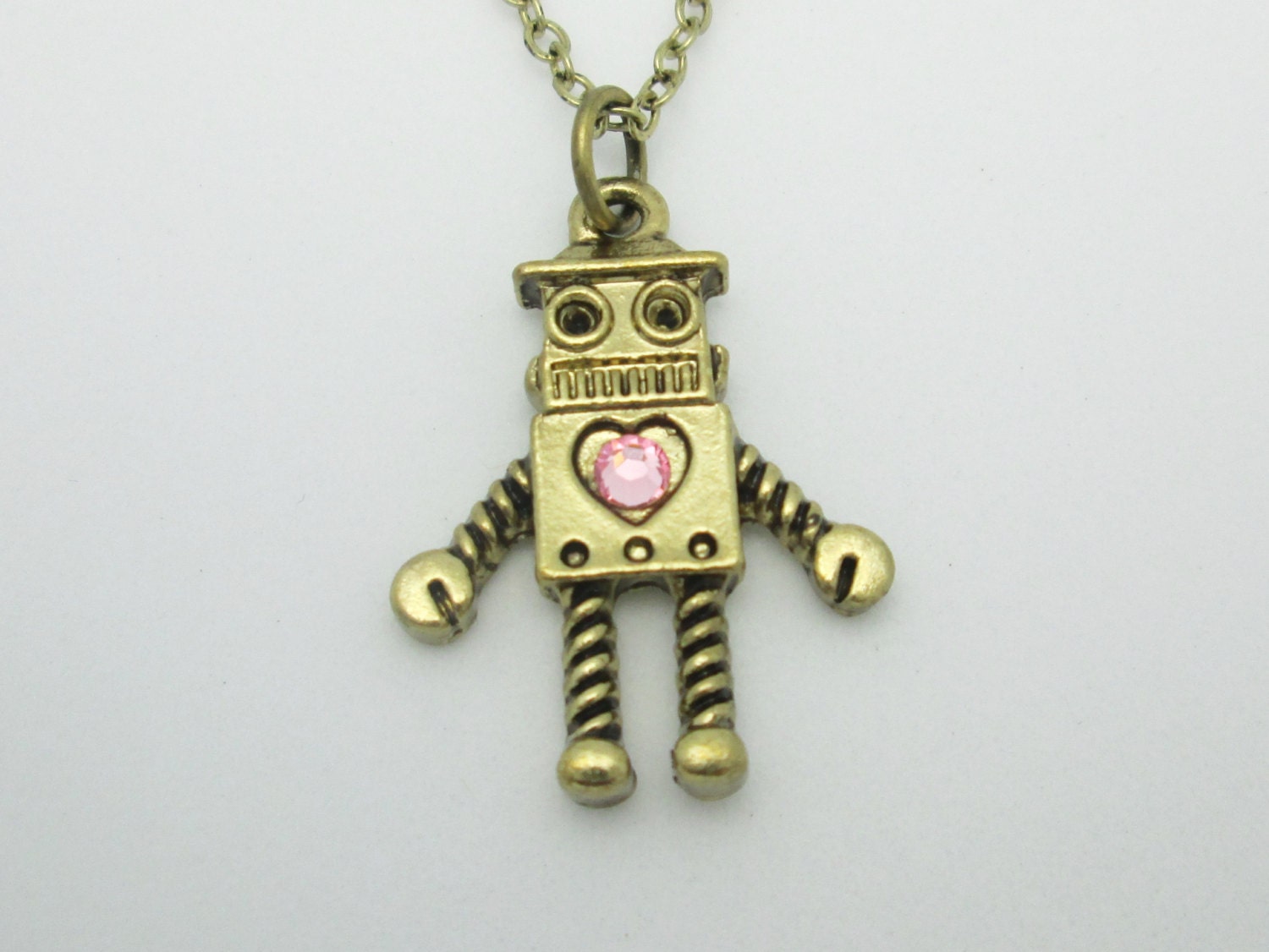 Geeky Robot Necklace (B072). Robot with a Heart in Antique Gold Finish with Pink Swarovski Crystal Gem