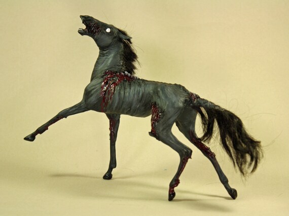 demon doll rocking horse