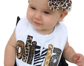 Personalized Bib Appliqued in animal prints for baby by Tried and True Designs on Etsy - TriedAndTrueDesigns