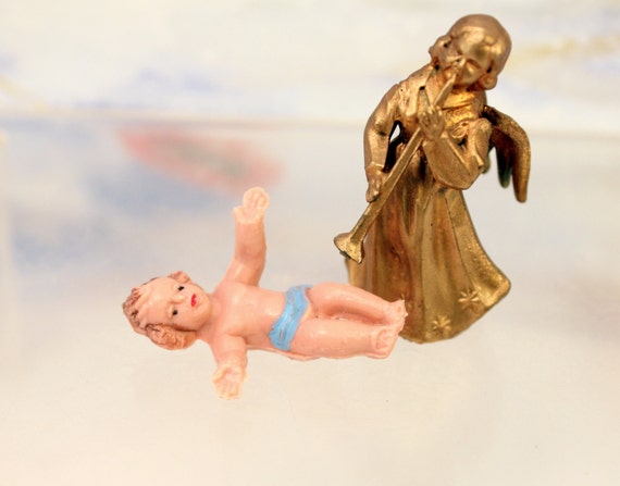 small plastic jesus figurines