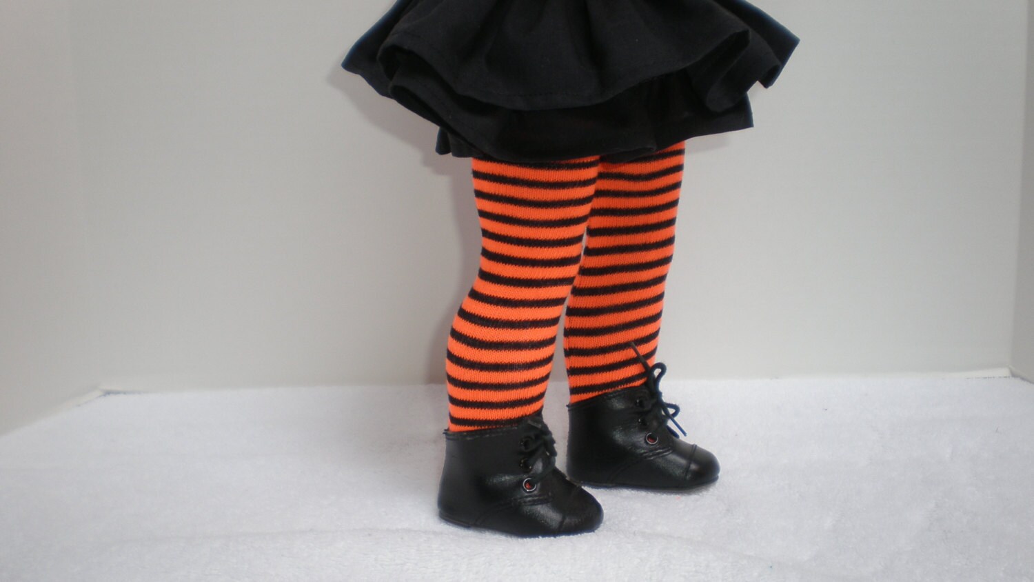orange and black striped knee high socks