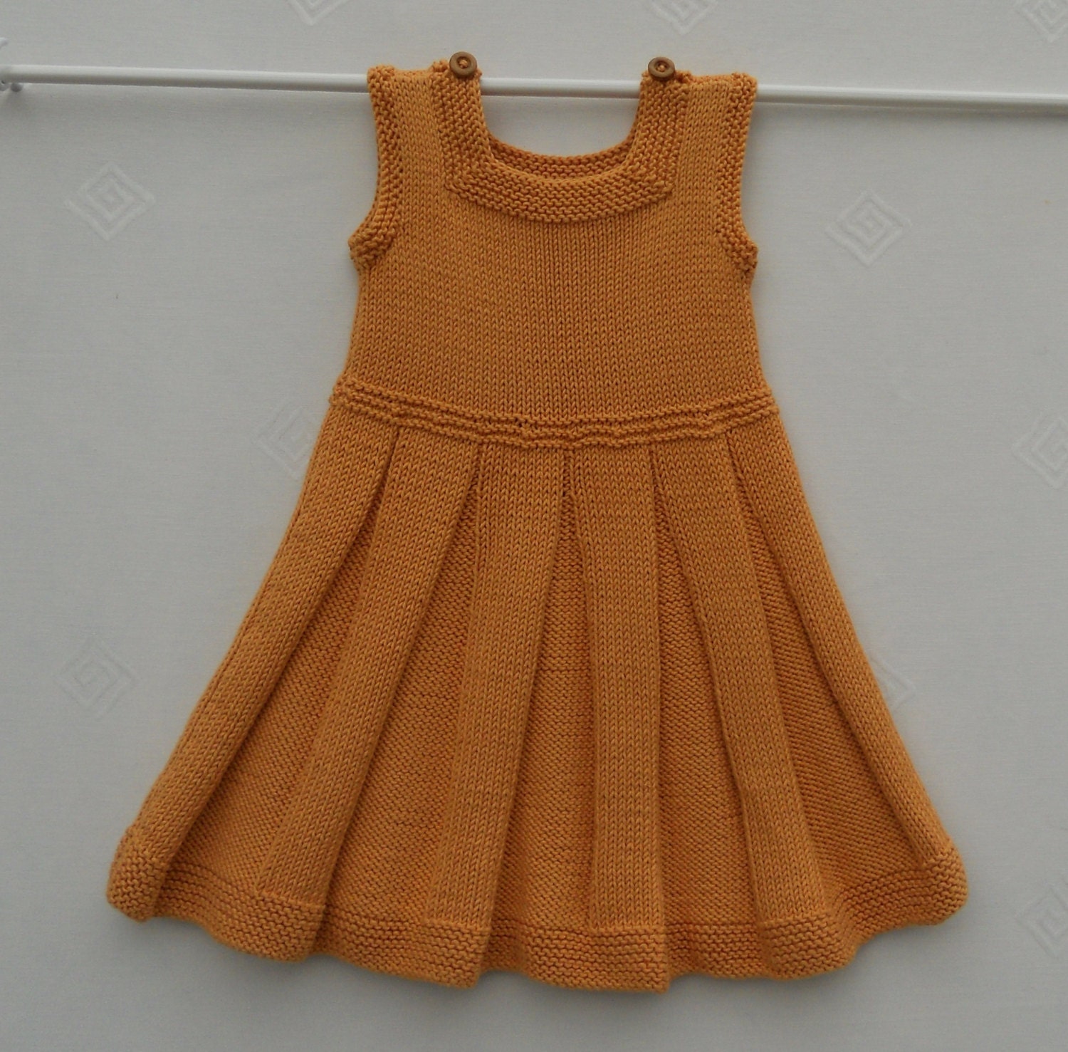 Baby girl/toddler dress or pinafore hand knitted in by ...