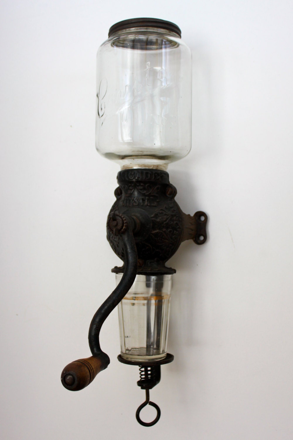 Antique coffee grinder with a glass by Brimfieldfinds on Etsy