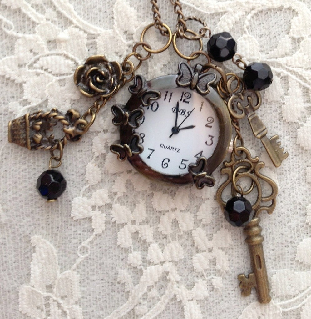 Butterflies and Flowers Small Pocket Watch. Antique Bronze Tone