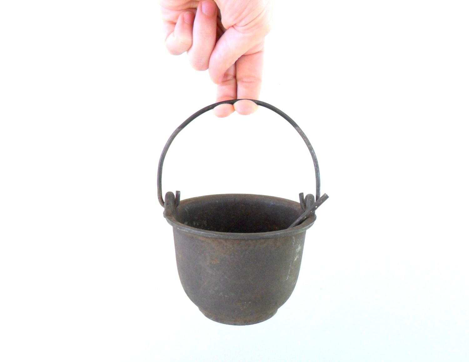 small antique cast iron cauldron with ladle pot by compostthis