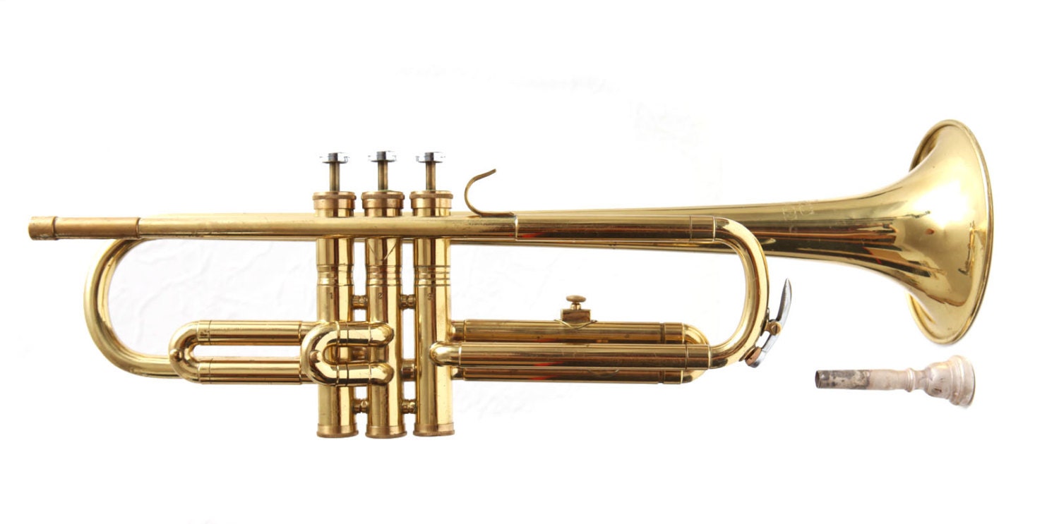 Melody Maker Trumpet with mouthpiece and case.