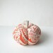Pumpkin Pincushion with Orange and White Design