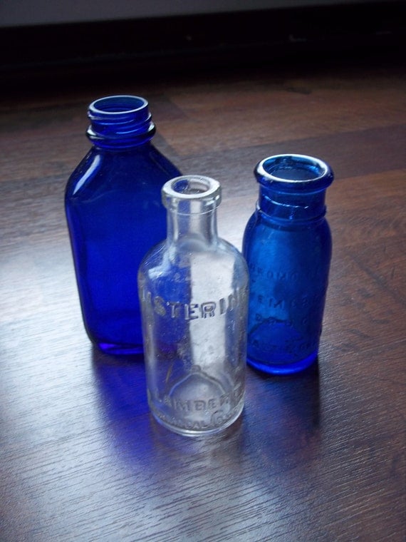 Three Antique Glass Medicine Bottles Two are by fromanotherday