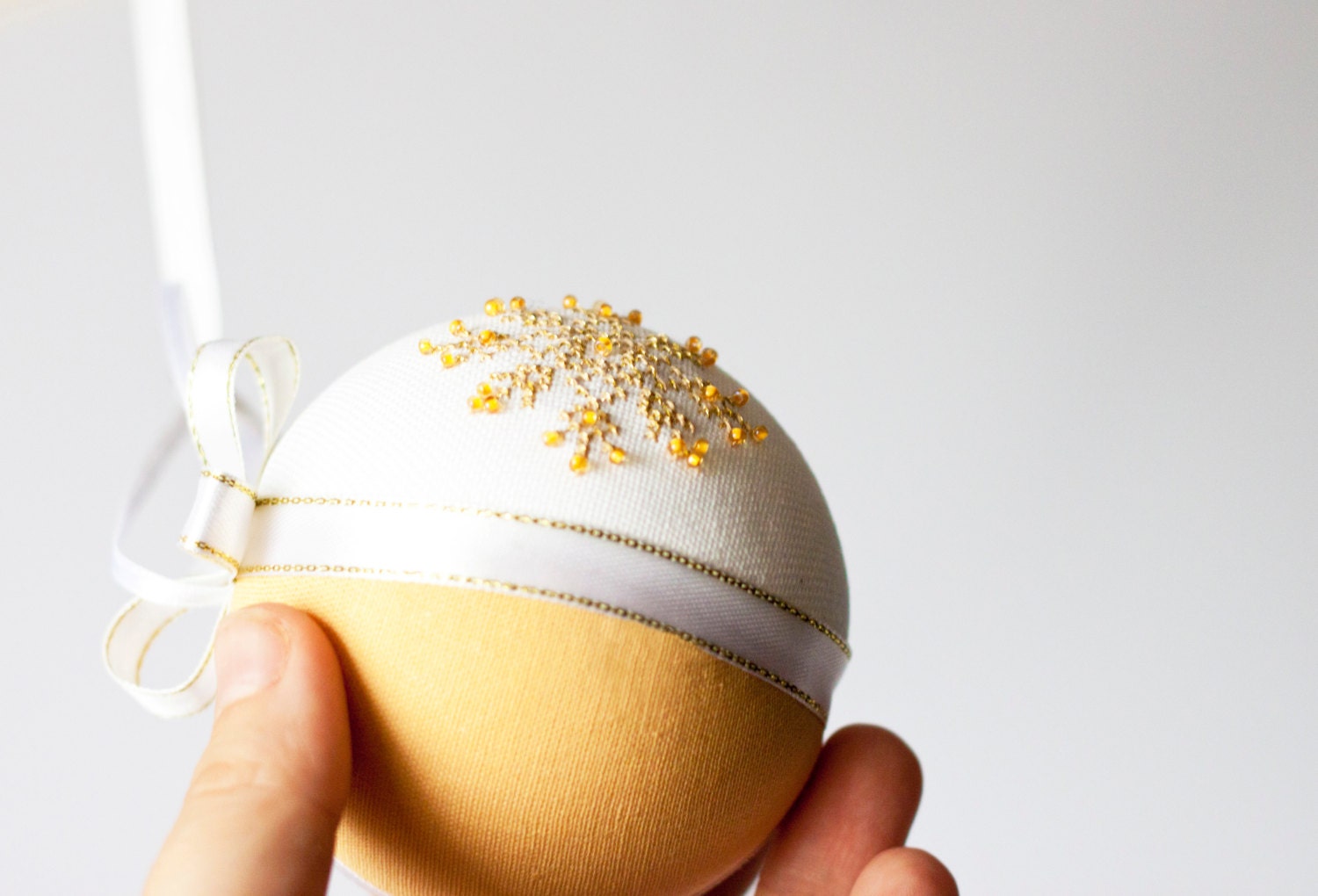 Christmas tree ornament color of champagne linen covered with cross stitch snowflake - RedPin Christmas tree ornament color of champagne linen covered with cross stitch snowflake - RedPin