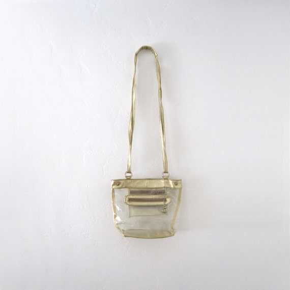 french vintage clear crossbody bag with gold leather straps  detail