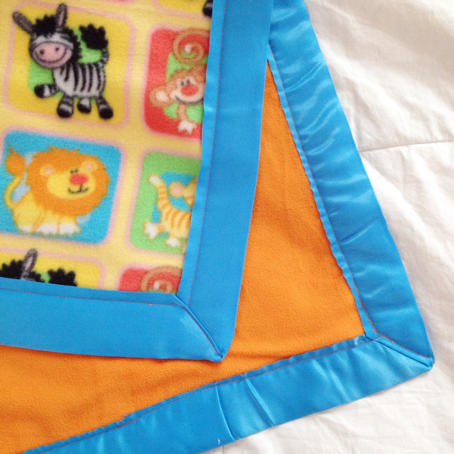 Items similar to Animal Zoo Print Fleece Baby Blanket on Etsy