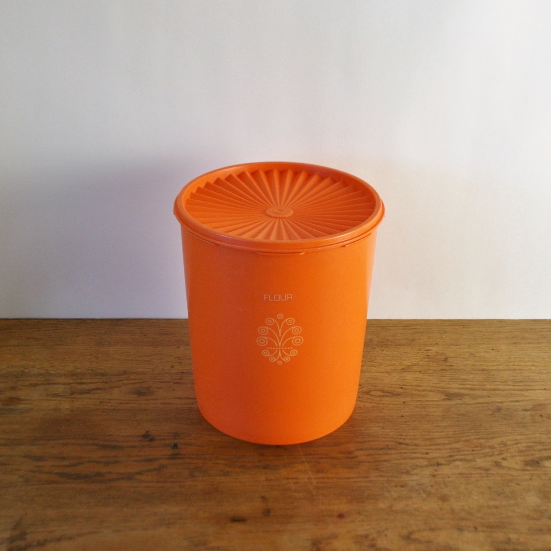 Vintage Large Orange Tupperware Flour Container by sariloaf