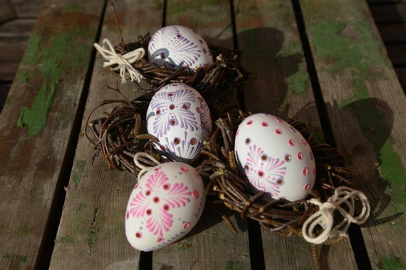 Drilled Madeira Easter eggs with wax colored patterns