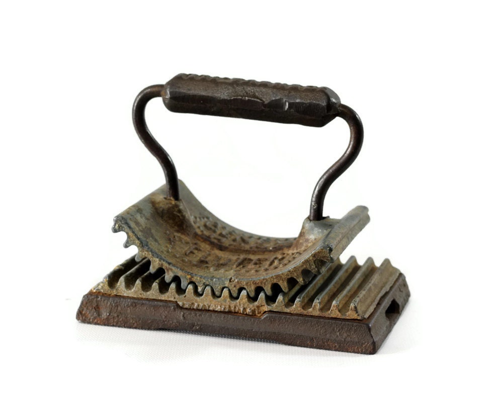 Vintage Geneva Hand Fluter Cast Iron Sad Iron by GizmoandHooHa