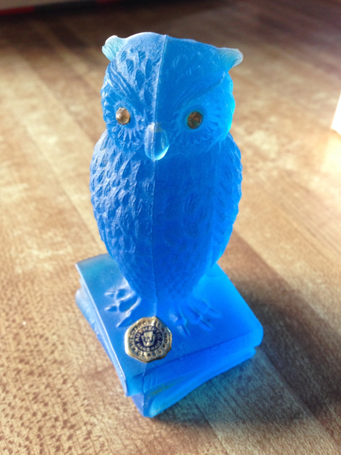 blue and white owl figurine