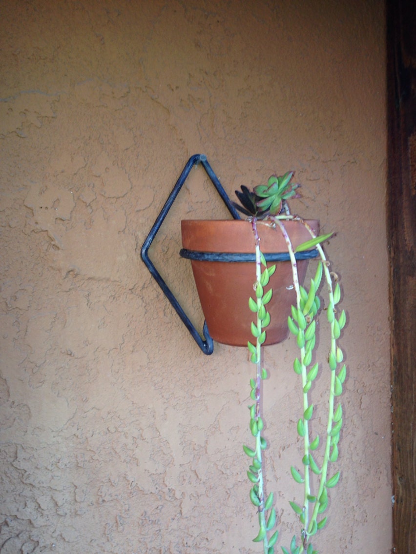 Items similar to Wall Mounted Wrought Iron Plant Holder on Etsy