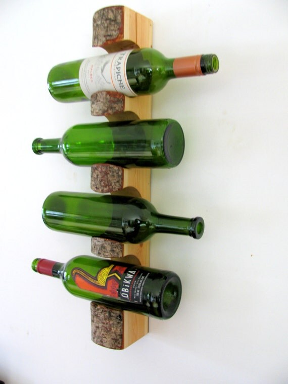 Rustic wall mount tree log wine rack. by WoodaCooda on Etsy