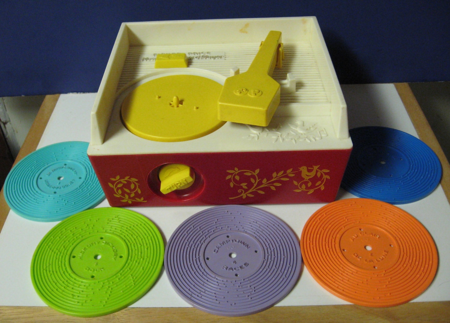 fisher price record player with 5 records