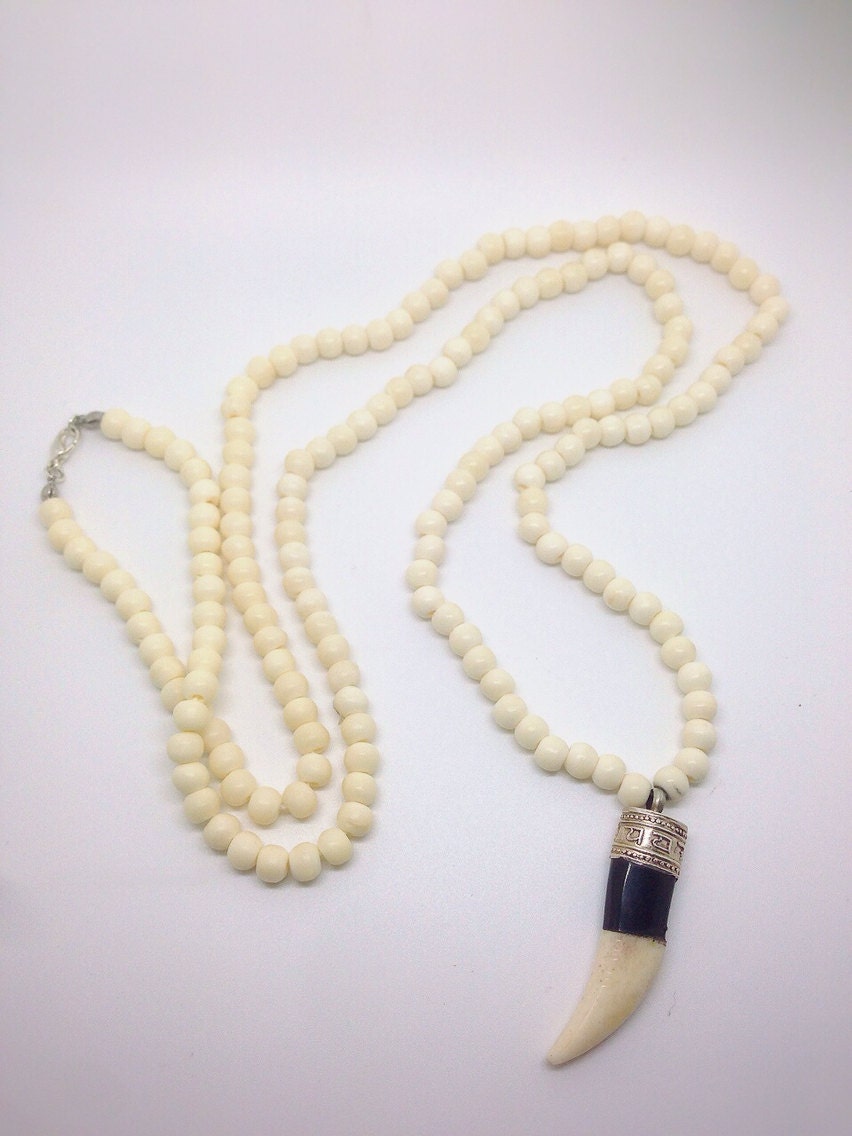 Ox bone bead necklace with Tibetan horn pendant by IMANLAKHANINY