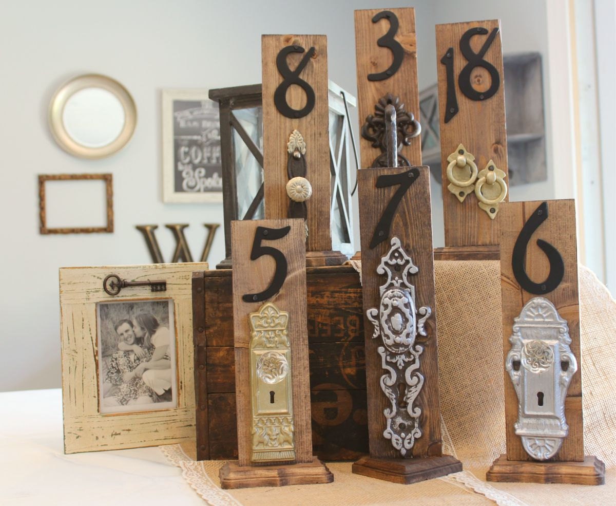 Door Knob Table Numbers - Rustic Walnut stained wood table numbers with unique hardware great for weddings, gold and silver