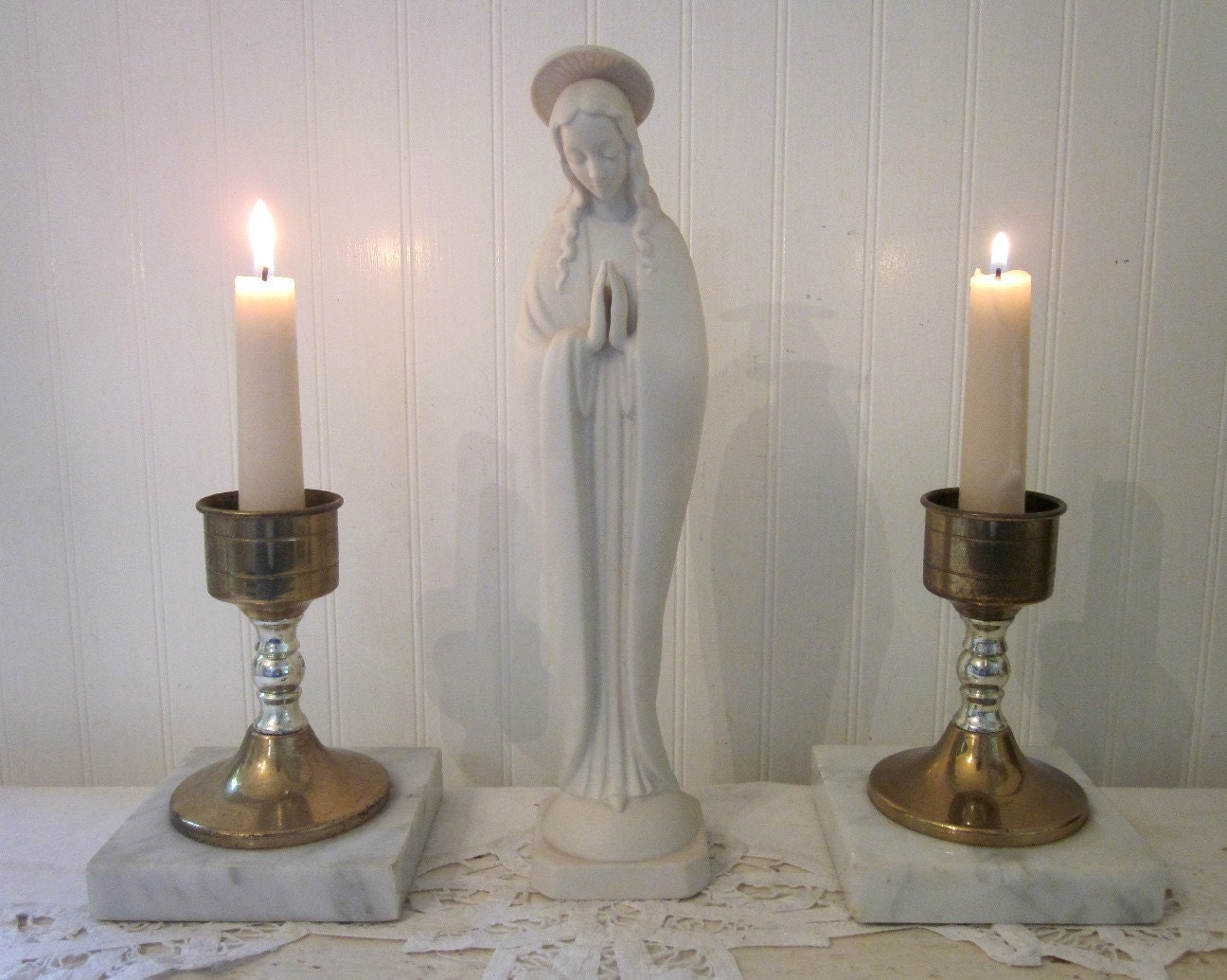 Image result for Vigil candles with the Blessed Virgin Mary