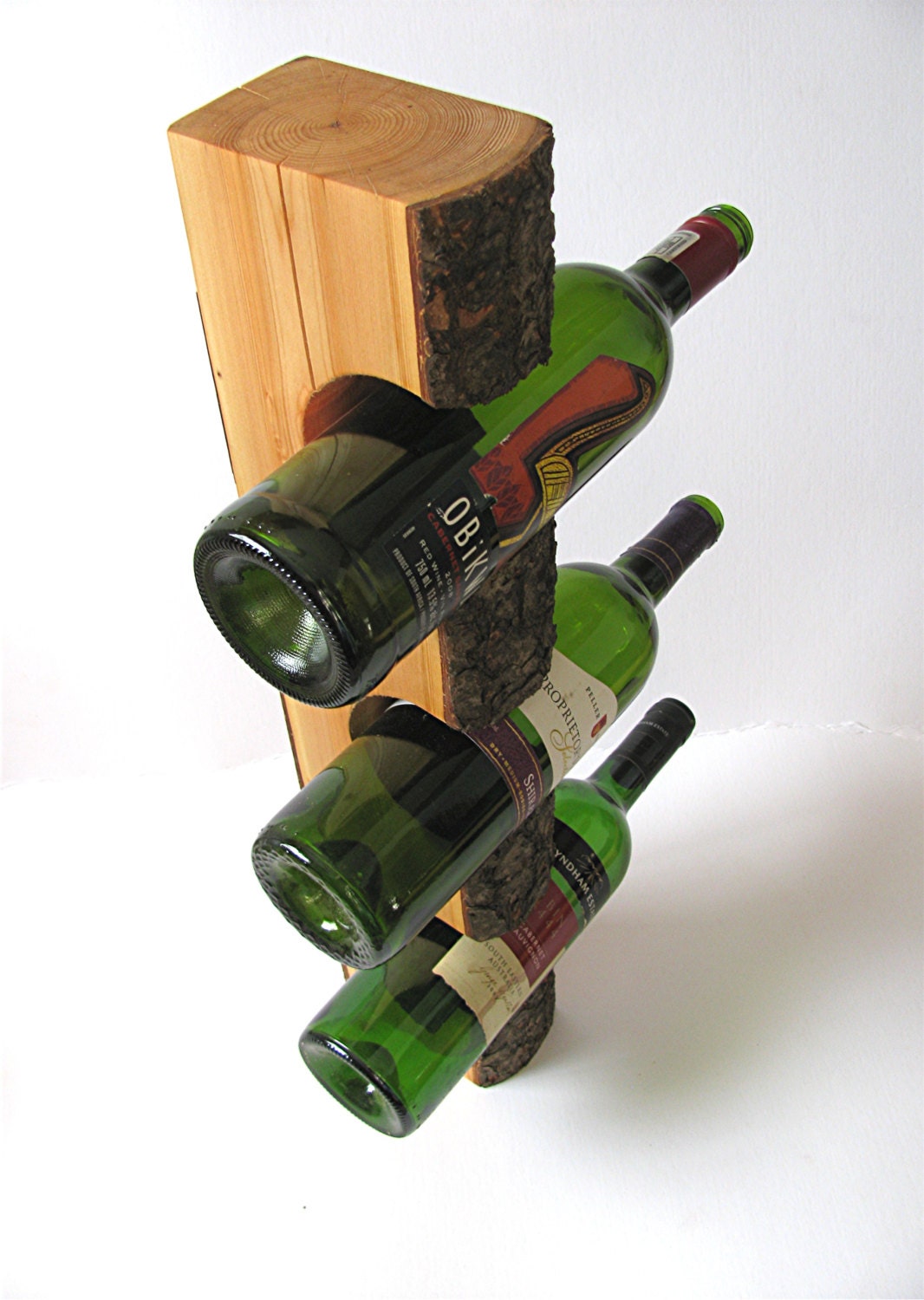 Items similar to Rustic wall mount tree log wine rack. on Etsy