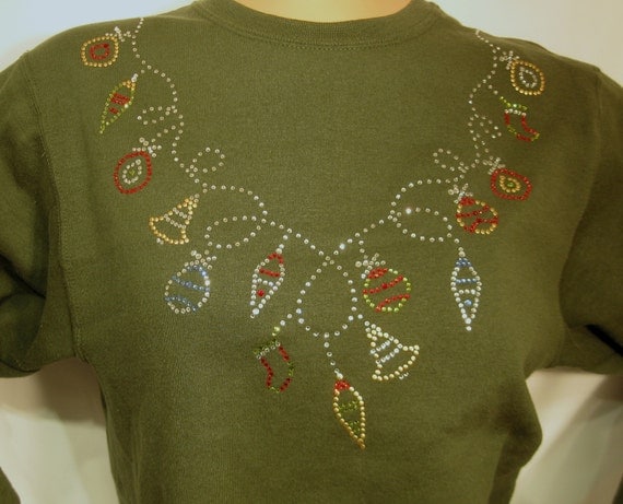 Green holiday pull over crew neck 50/50 poly- cotton blend sweatshirt. Small thru 4x sizes available.