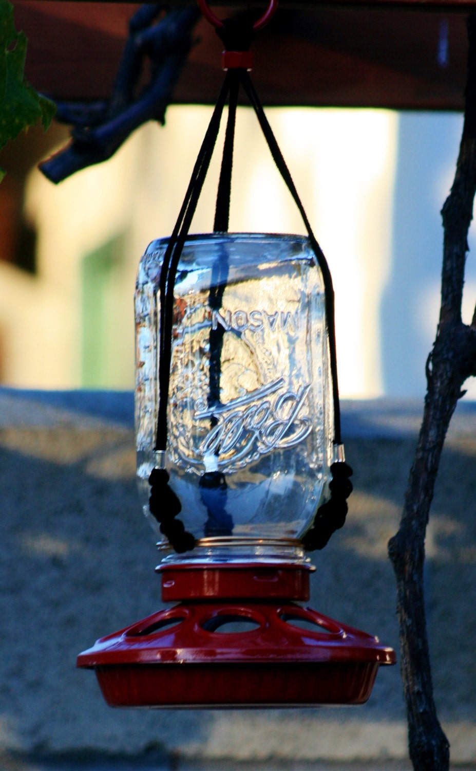 Red hanging mason jar bird feeder. Bird by UpcycledMasonDesigns