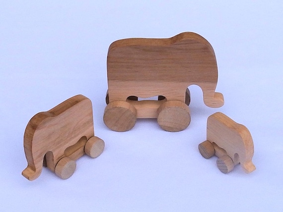 Wooden animals on wheels Elephant by EcoWoodToys on Etsy