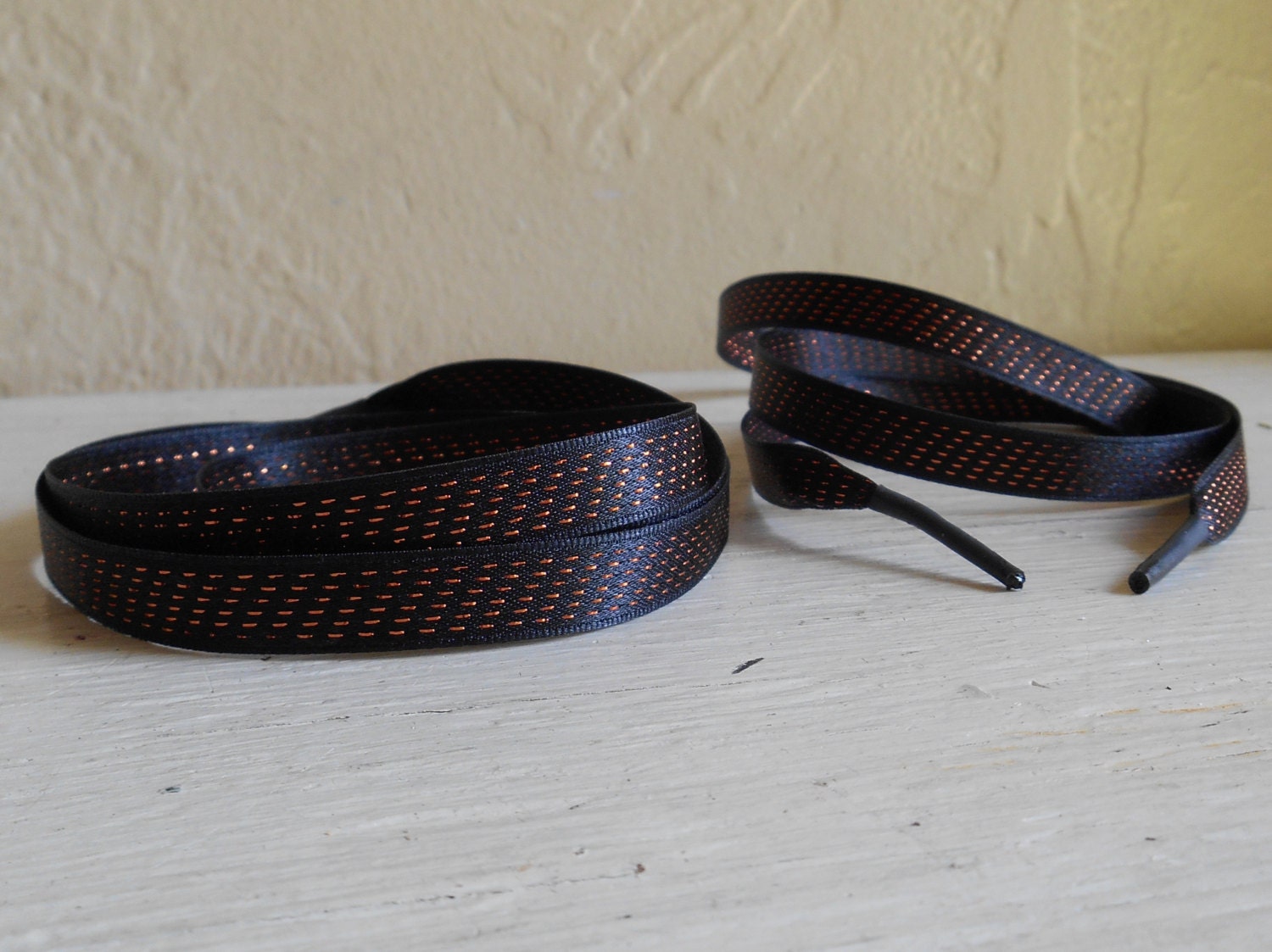 orange and black shoelaces