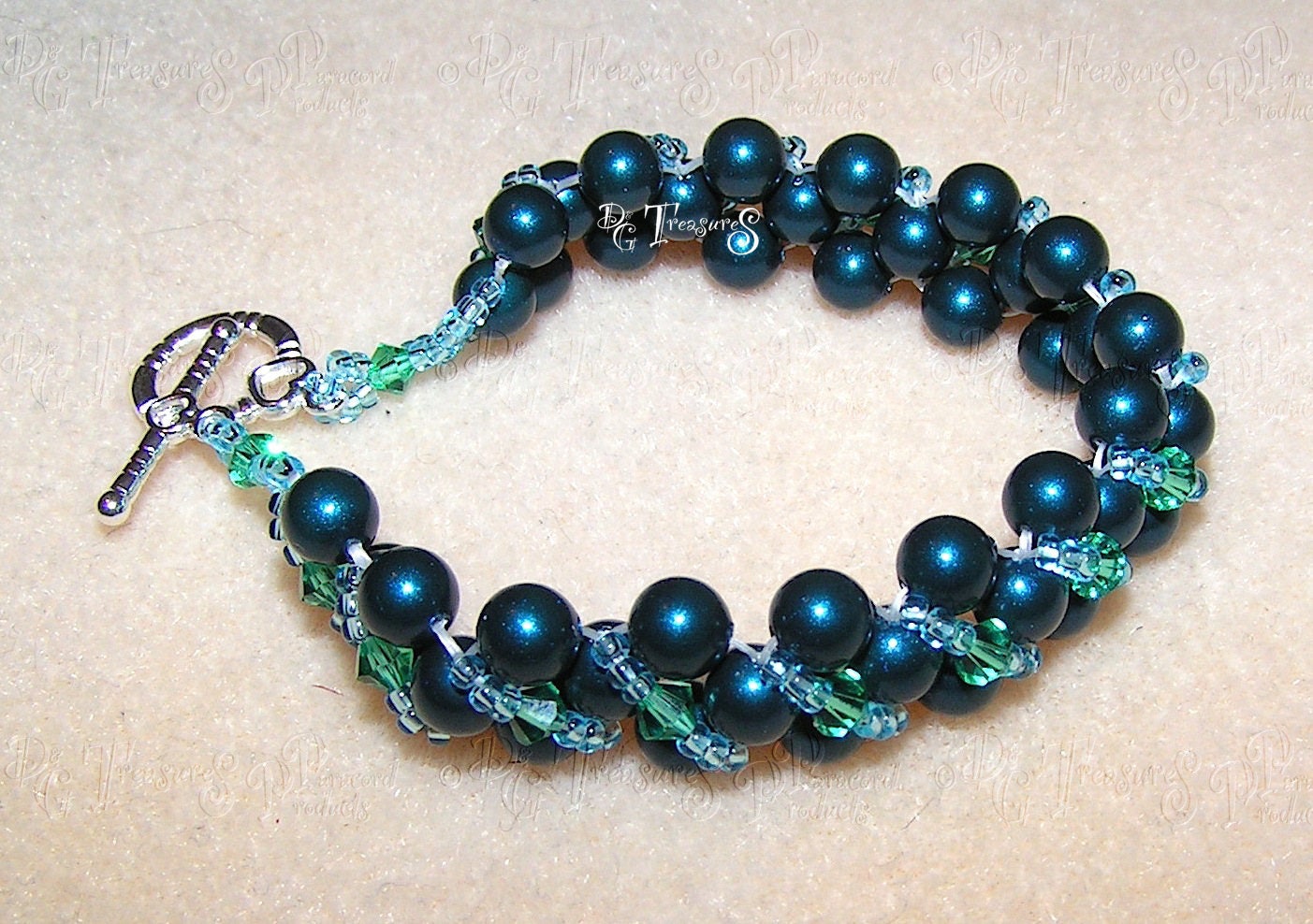 A Bracelet Of Swarovski Pearls Bicones Seed Beads And A