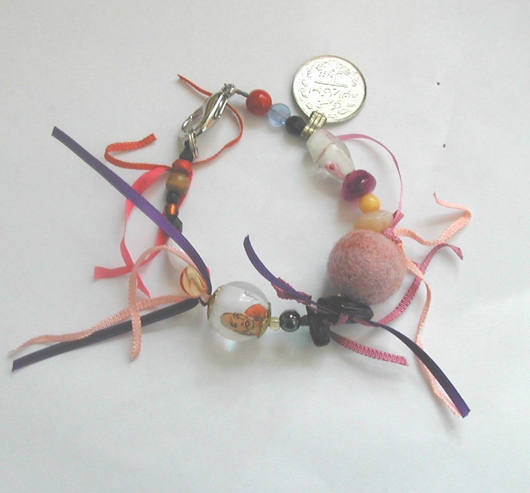 PINK ROUND THE WORLD BRACELET