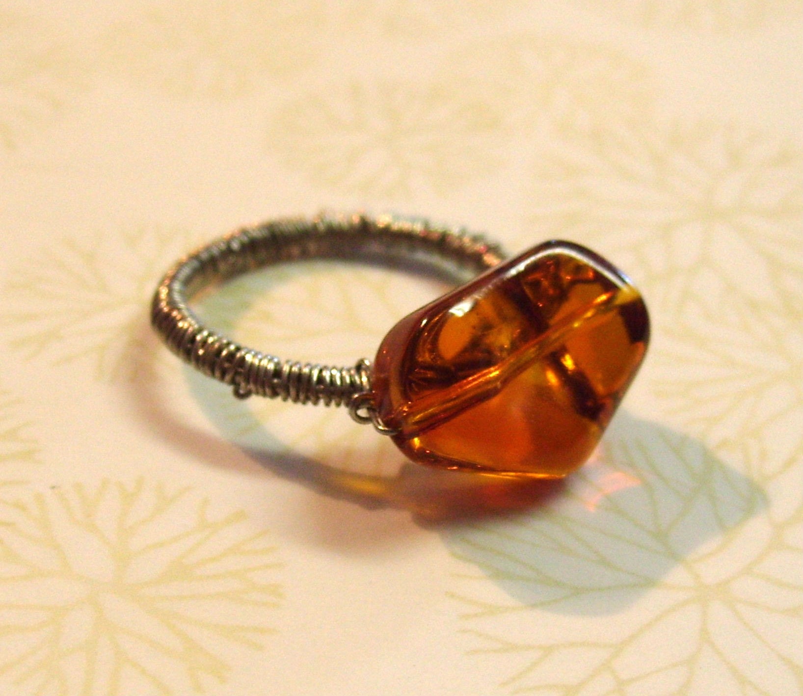 Size 8.5 Ring with Topaz colored charm
