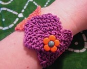 Purple and orange knitted cuff bracelet