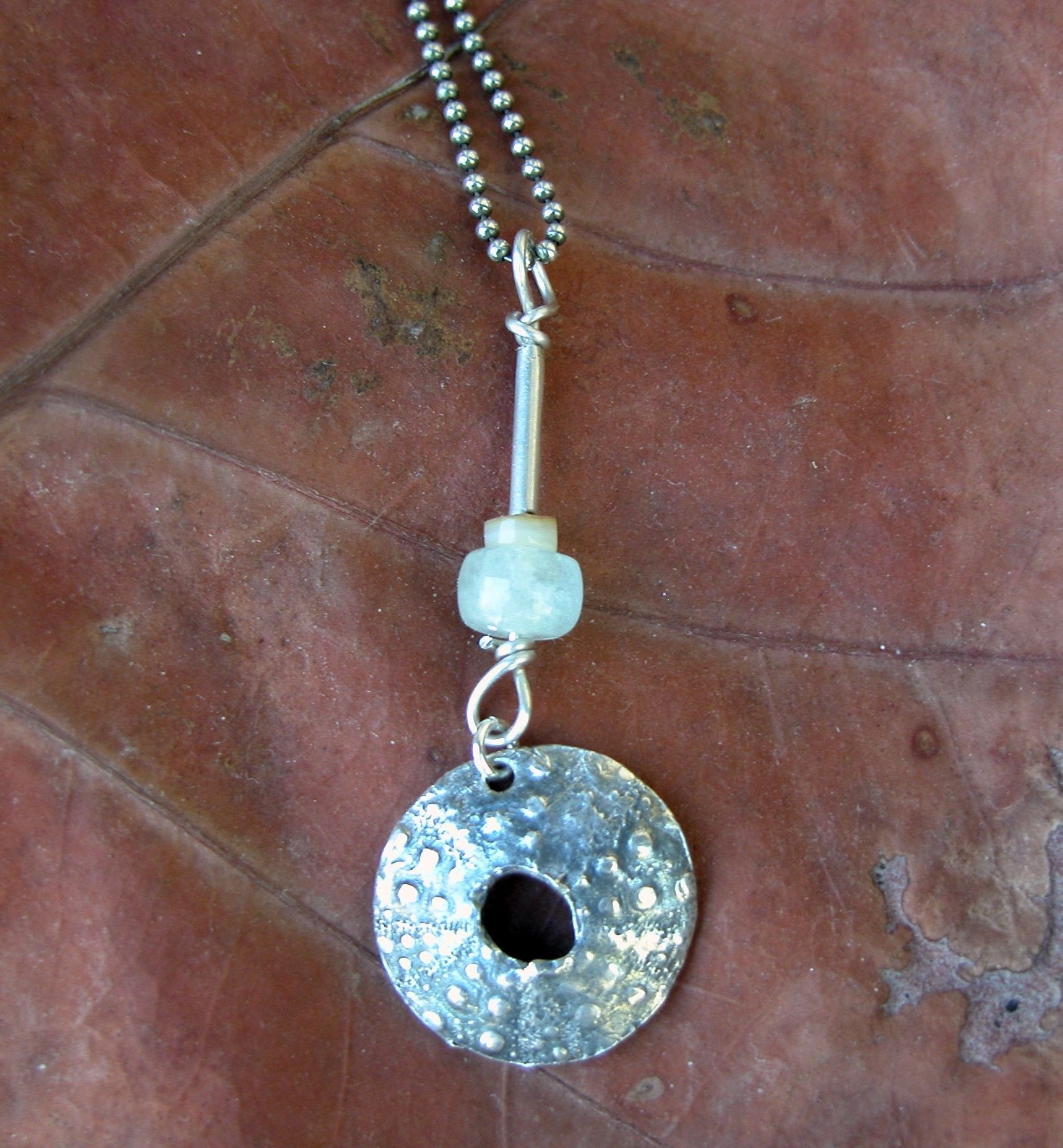 sea urchin pendant with aquamarine