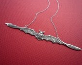 skinny bat necklace in silver