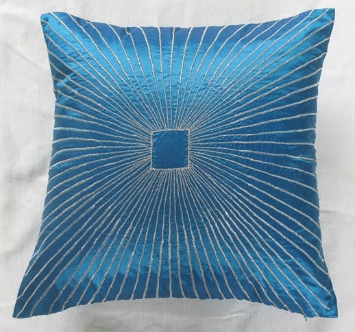 turquoise blue pillow w/ graphic, geometric lines embroidere  in silver