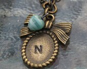 Personalized Necklace Hand Stamped Antiqued Brass Oval Frame With  Initial And Turquoise Heart Bead-By Inspired Jewelry Designs