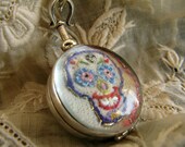 Hand Embroidered  Art Piece in a Two Sided Glass Locket , Sterling Silver Mounted Pendant