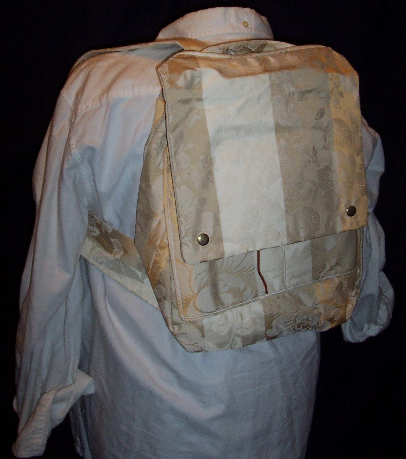 Clara Backpack in Taupe, Gold, and Cream Striped Silk with a Magnolia Blossom Pattern and a cream linen lining