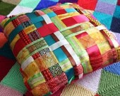 Multi-coloured woven ribbon kitsch cushion pillow