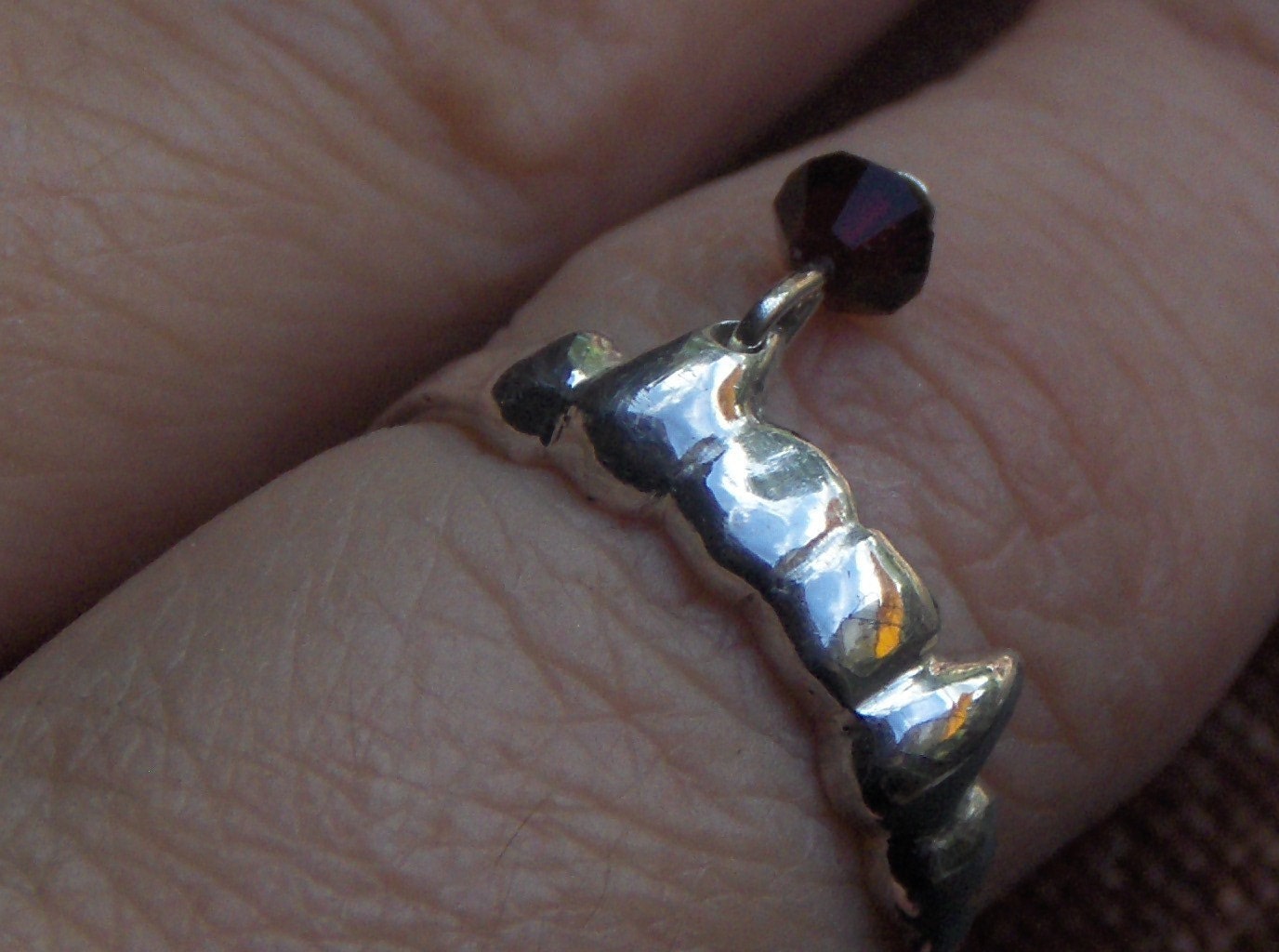 Silver Vampire Fang Ring with Red Crystal Blood Drop .